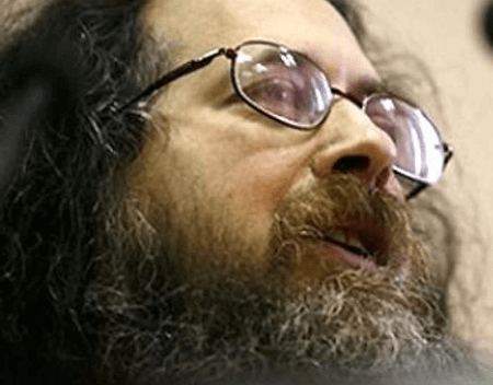 A closeup photo of Richard Stallman speaking.